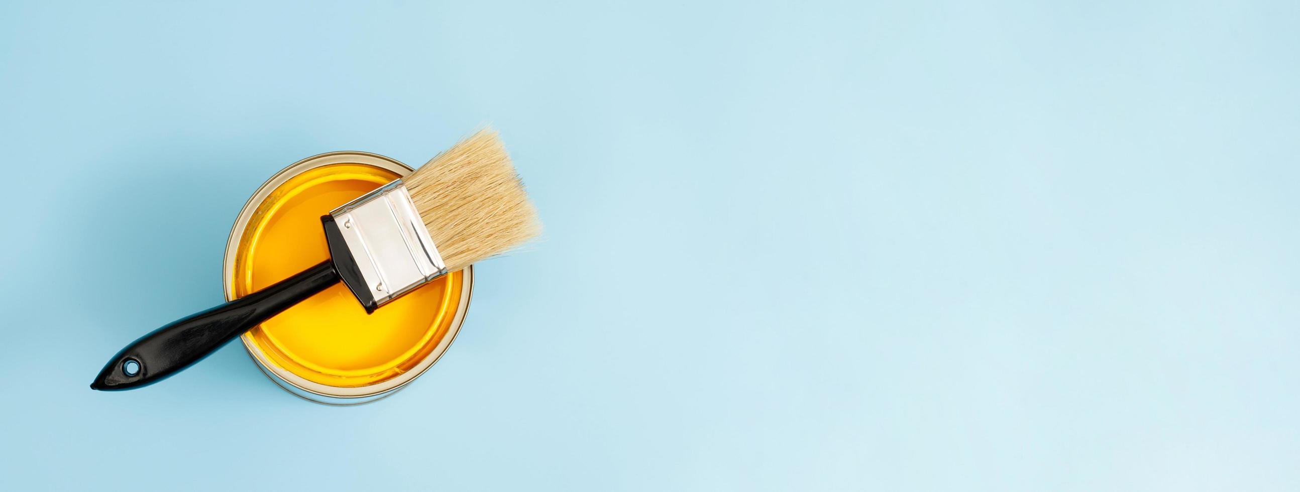 Paint cans and paint brushes and how to choose the perfect interior paint color and good for health photo