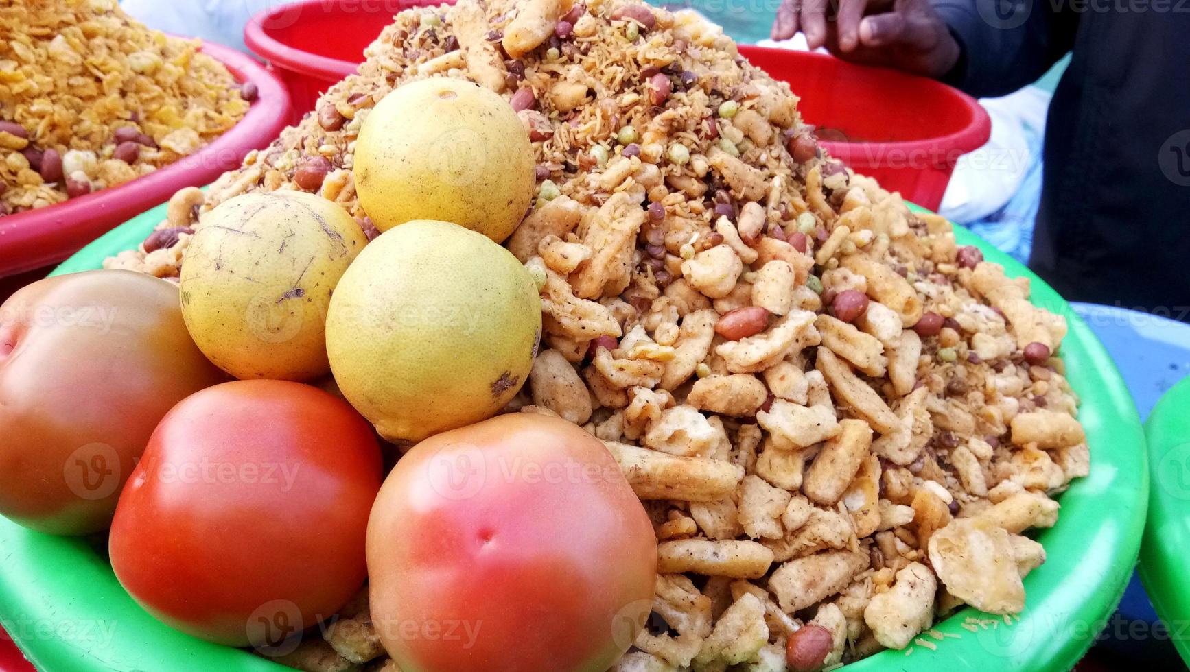 A street vendor selling a famous crispy snack - Churmura and namkeen bhujia photo