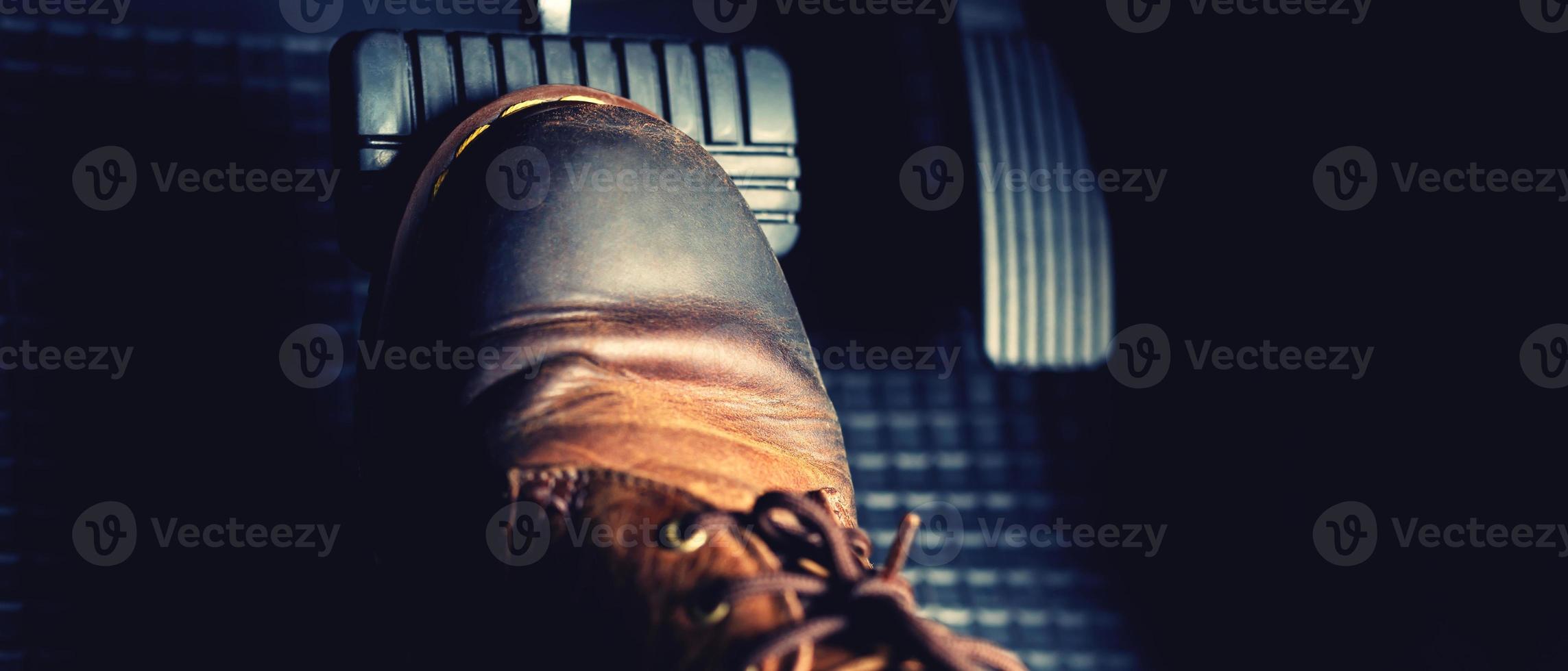 man stepping on car brake To slow down, stop the car both normal photo