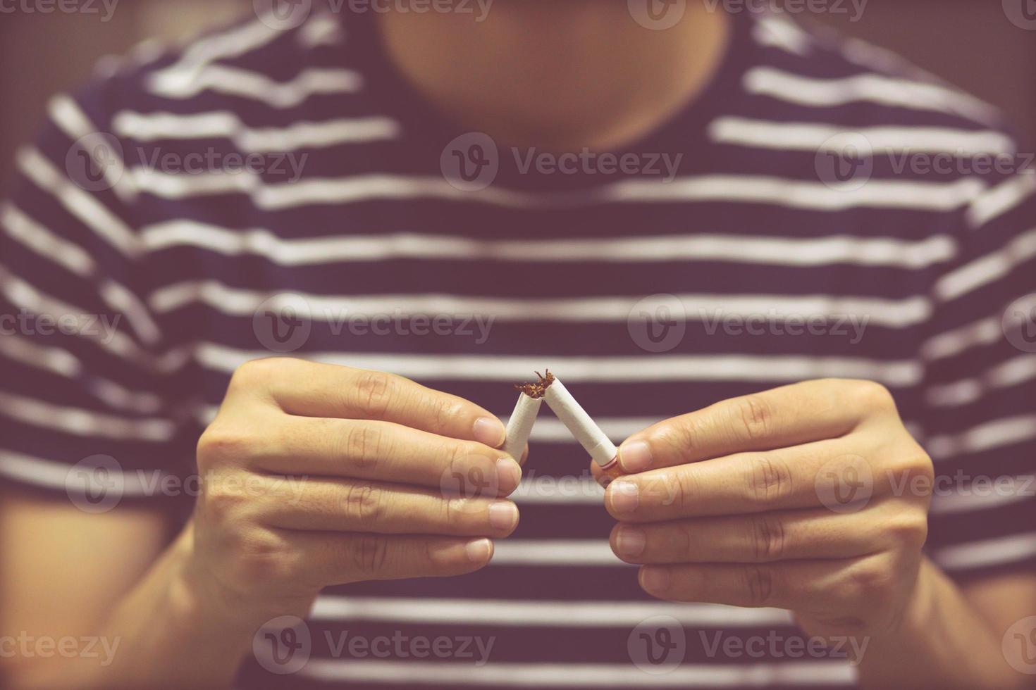 Man refusing cigarettes concept for quitting smoking and healthy lifestyle.or No smoking campaign Concept. photo