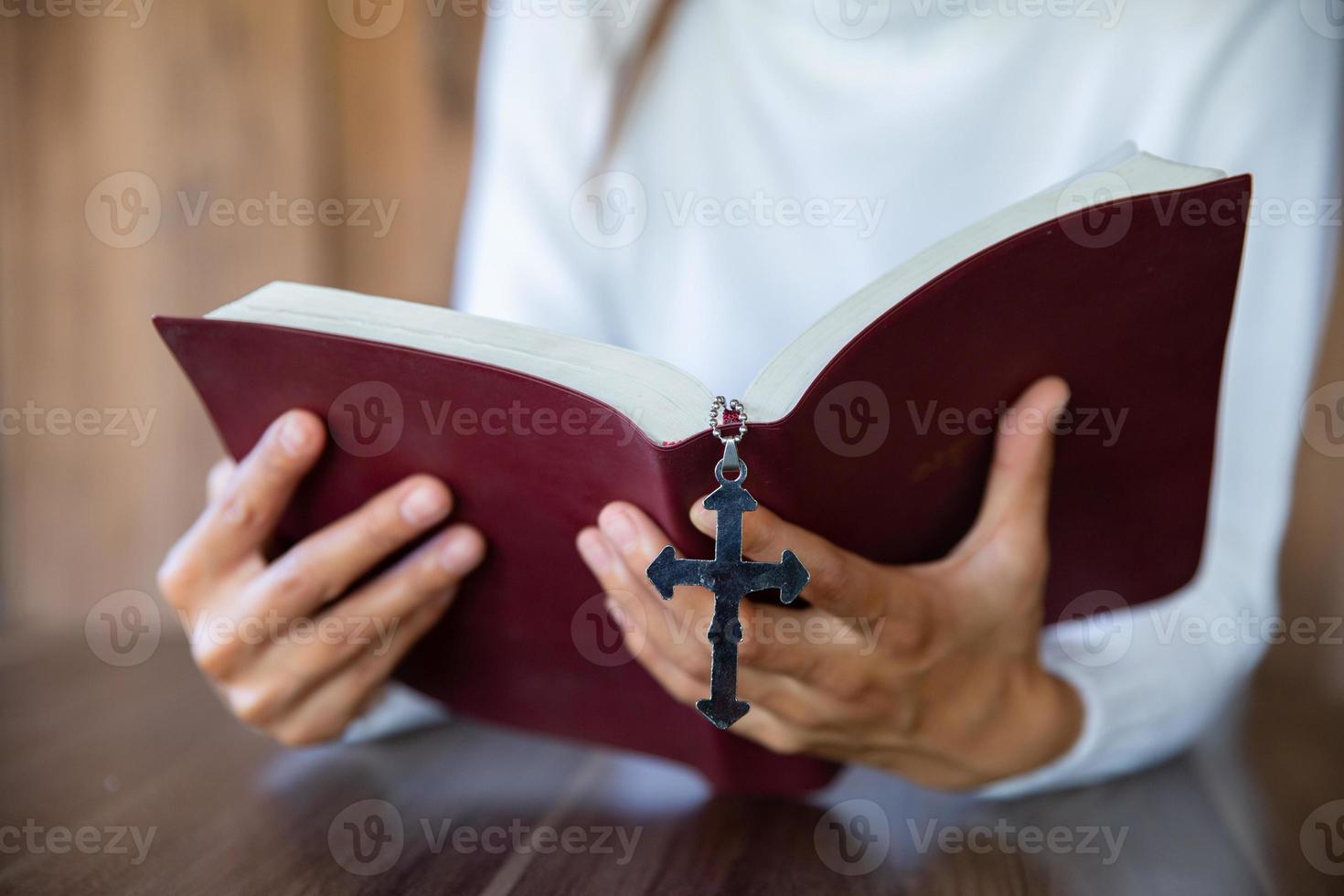 Women reading the Holy Bible, Reading abook,  praying on holy bible. photo