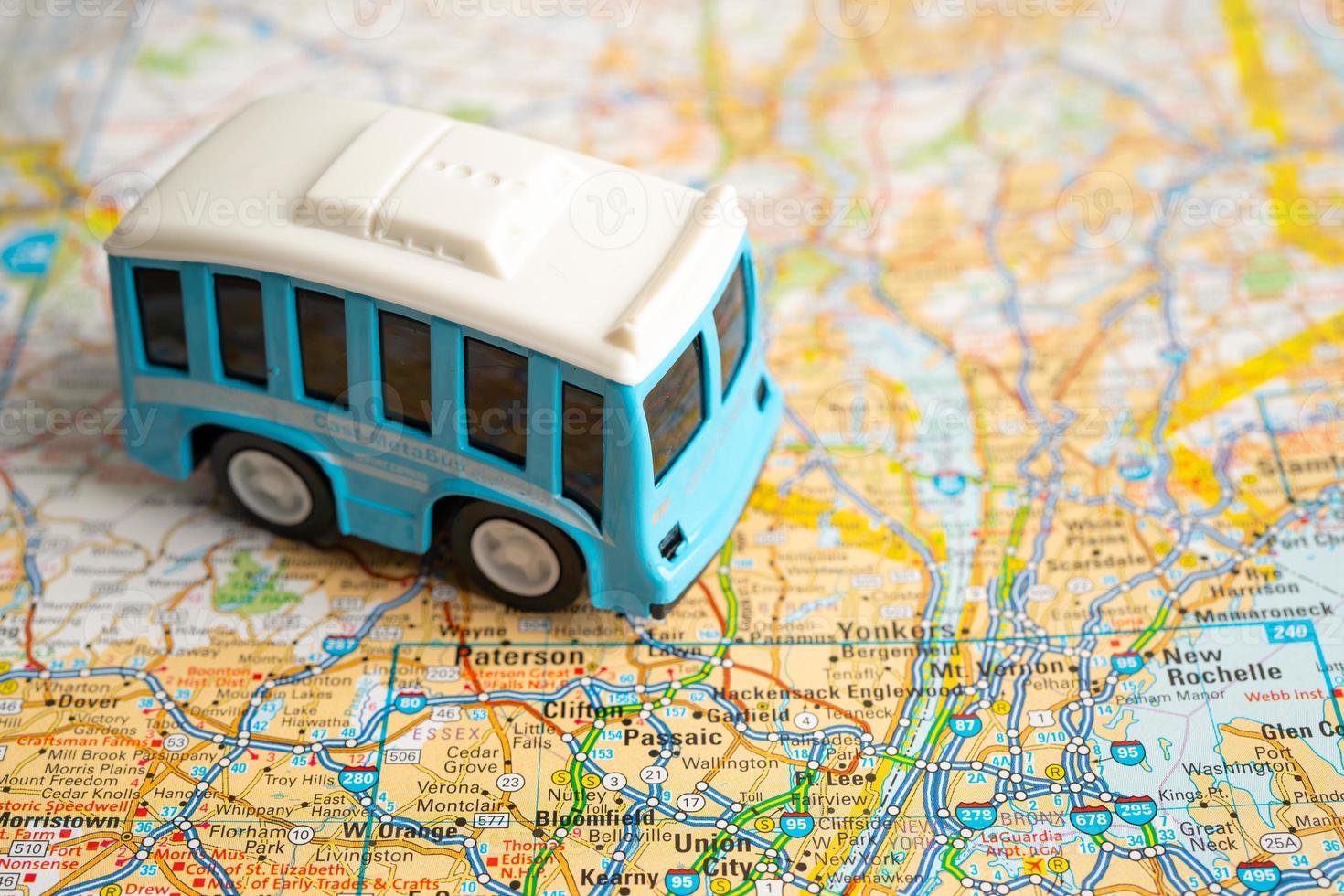Bangkok, Thailand - September 1, 2022 Bus car vehicle to travel on world map, geography, tourism and exploration concept. photo