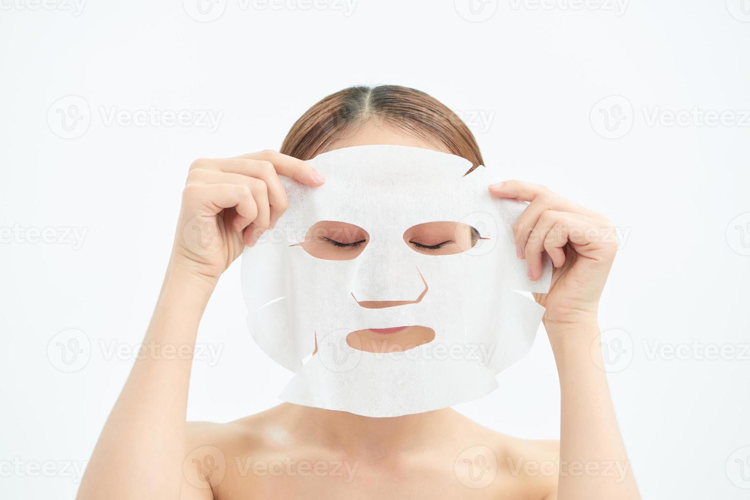 closeup young beauty face and facial mask photo