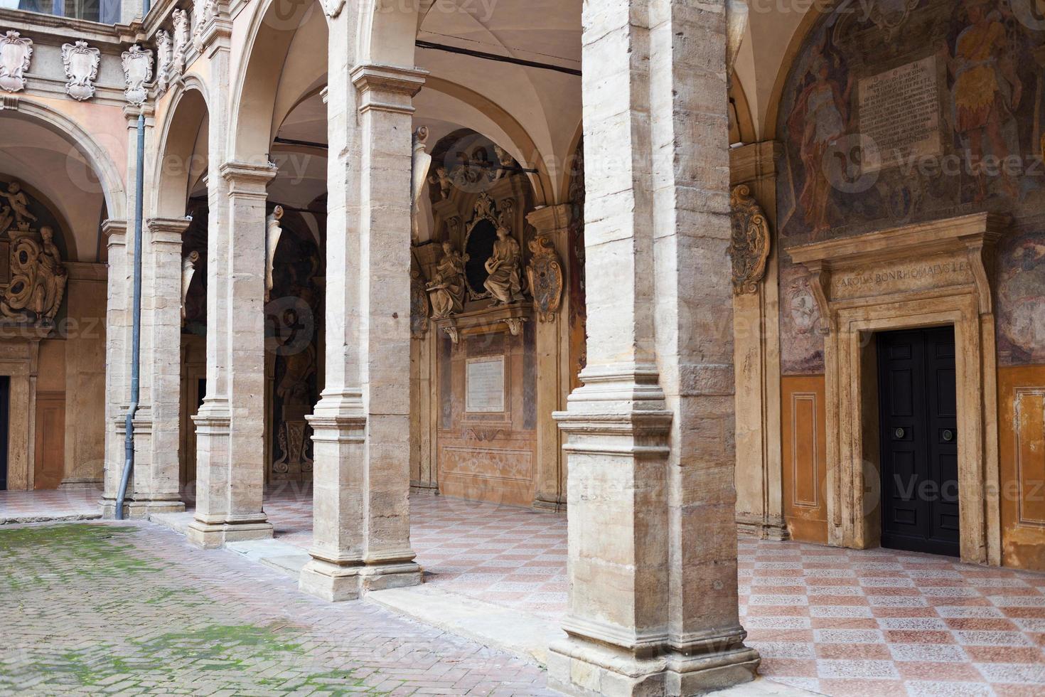 arcade and courtyard of Archiginnasio palace, Bologna photo