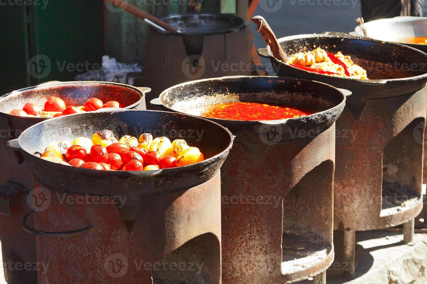 ovens with tatar cooking on outdoor cafe photo