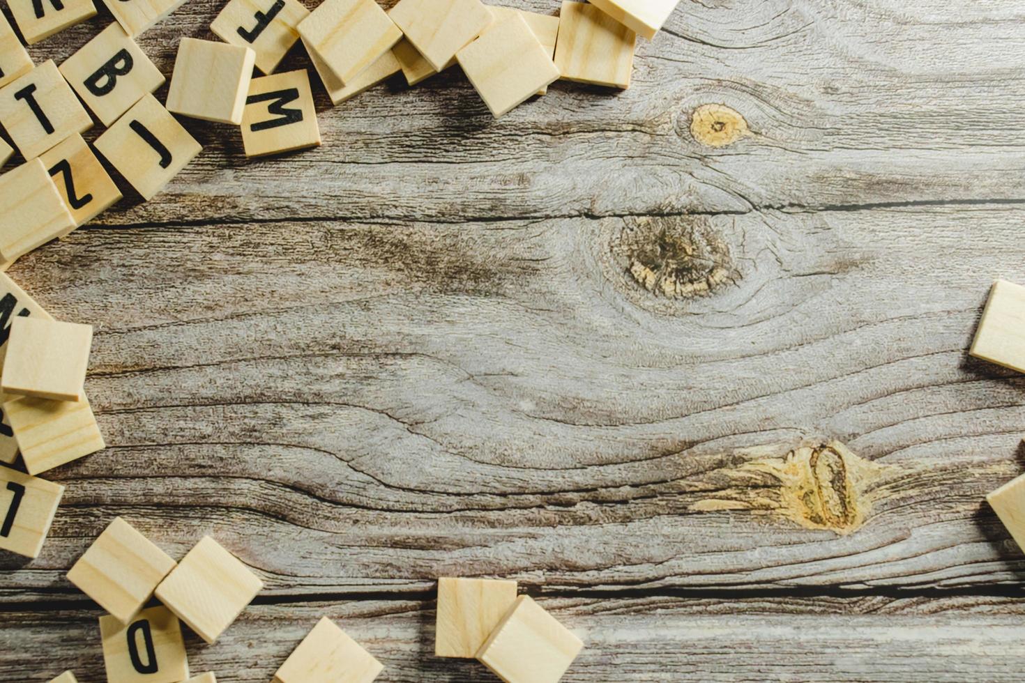 empty space on a wooden background Word Written In Wooden Cube on wood background photo