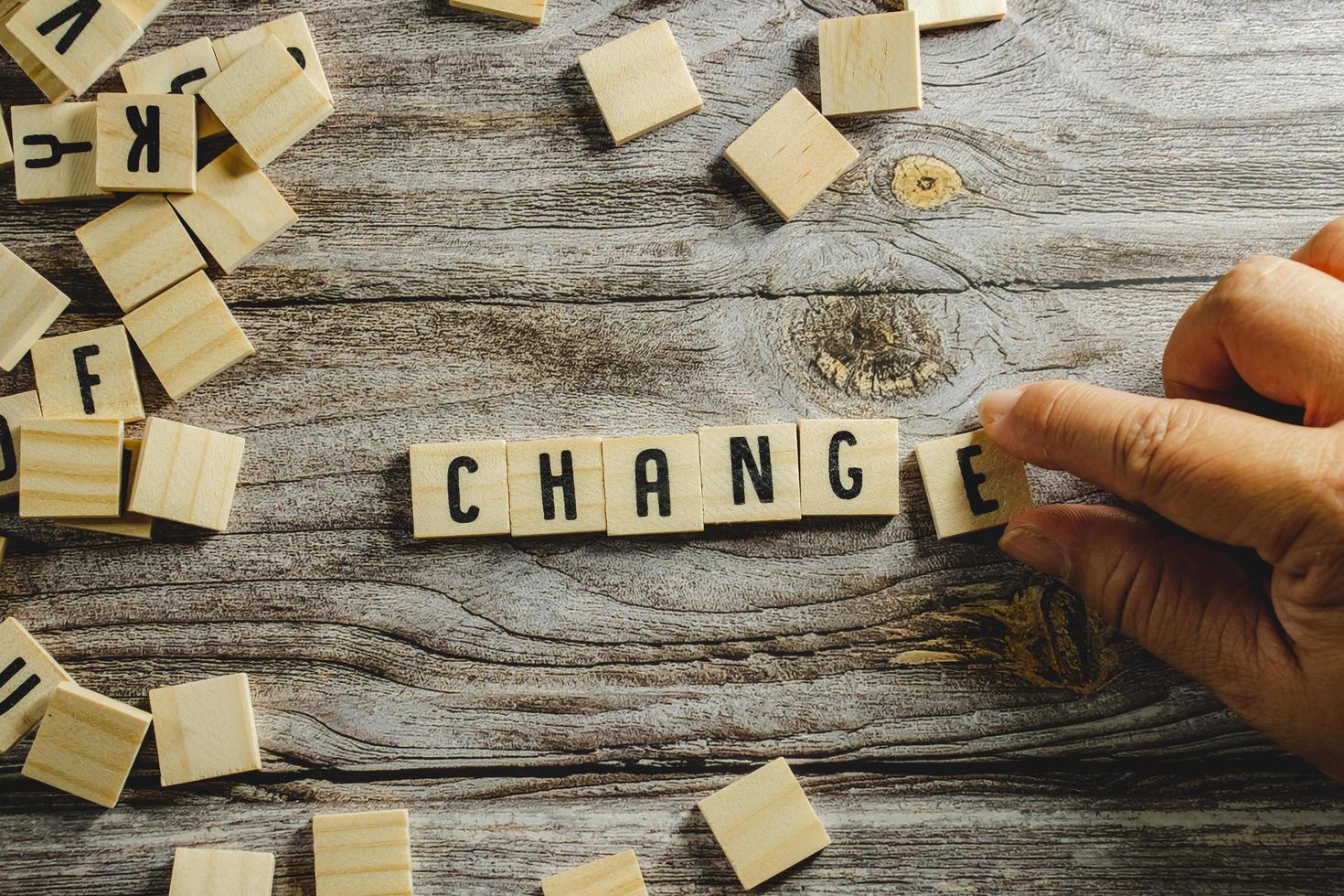 Change word cube on wood background ,English language learning concept photo