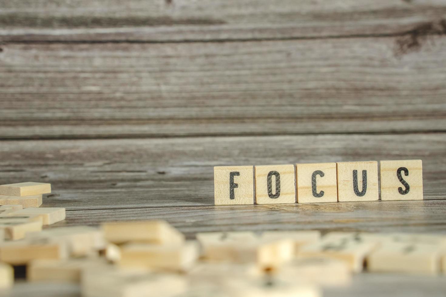 Focus Word Written In Wooden Cube photo