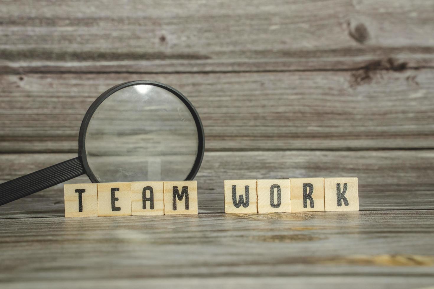 the word of TEAMWORK on wood tiles concept photo