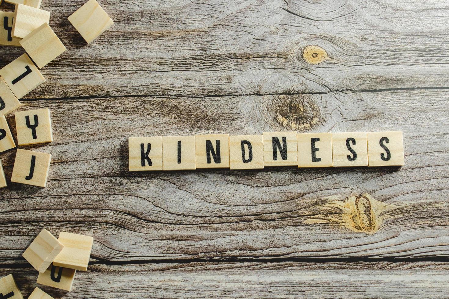 Kindness Word Written In Wooden Cube photo