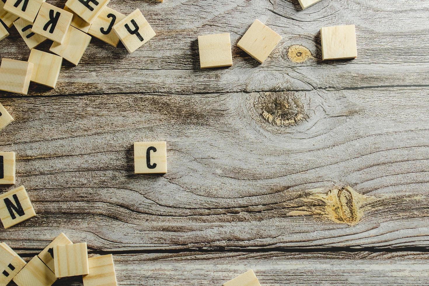 Change word cube on wood background ,English language learning concept photo