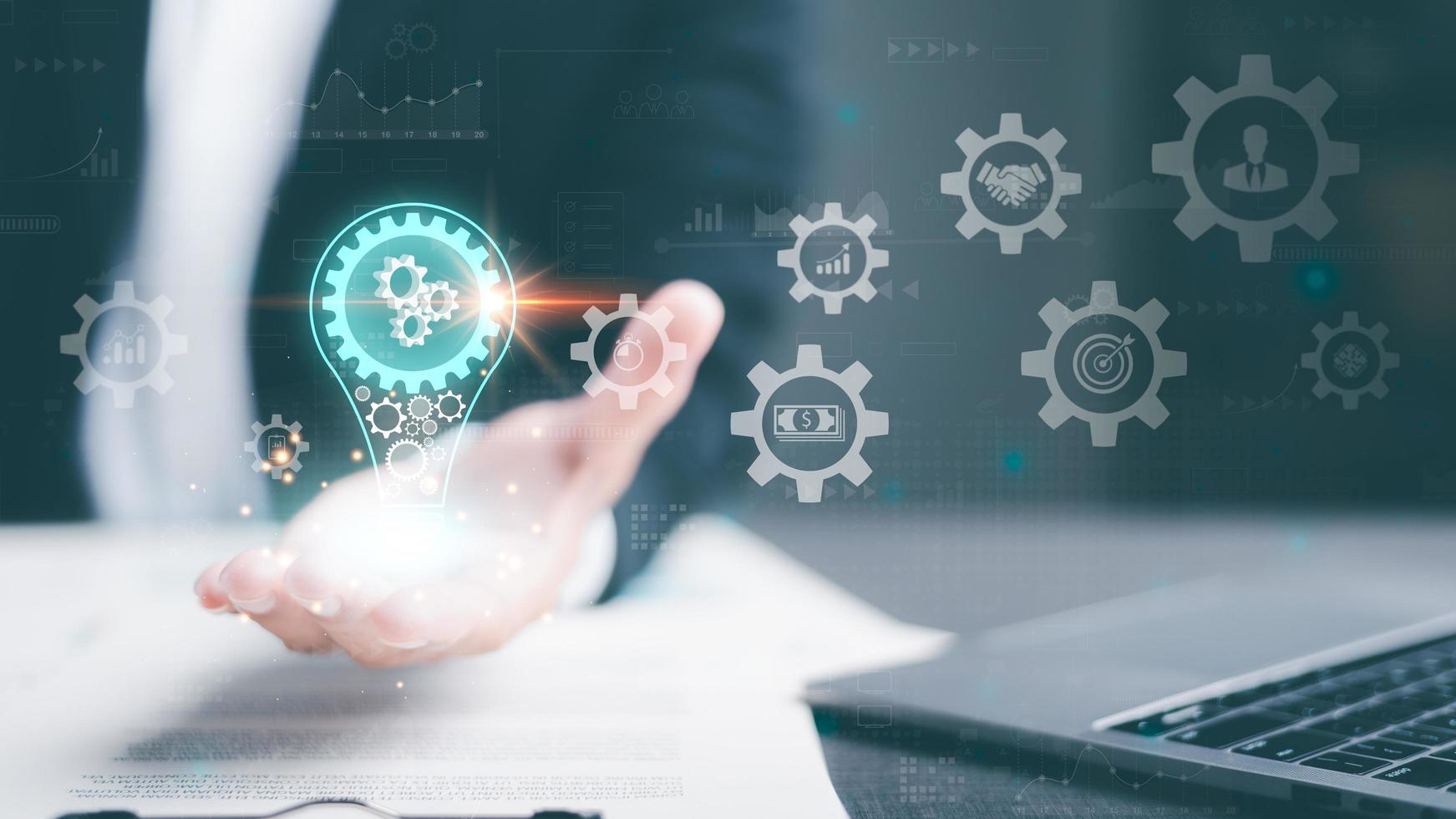 Success Goal Concepts Through Strategic Planning and Management Efficient business growth analysis and development financial investment opportunity, businessman showing light bulb icon on hand photo