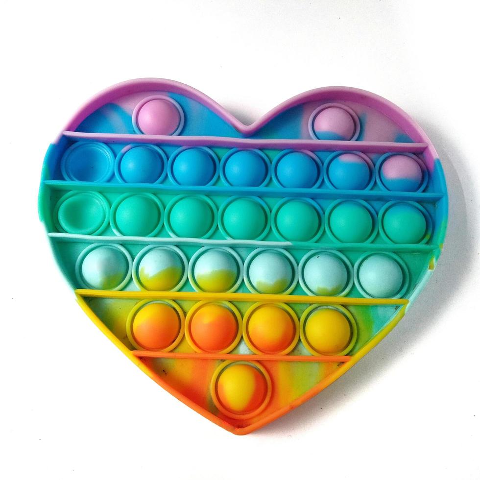Colorful Push Pop It Bubble Sensory Fidget Toys heart-shaped and rainbow colored , Silicone Toys, Anti Anxiety and Stress Relief Game. photo