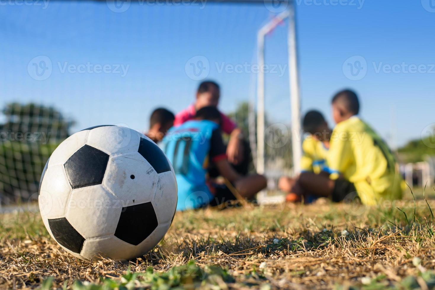 soccer ball and sports teacher and student background photo