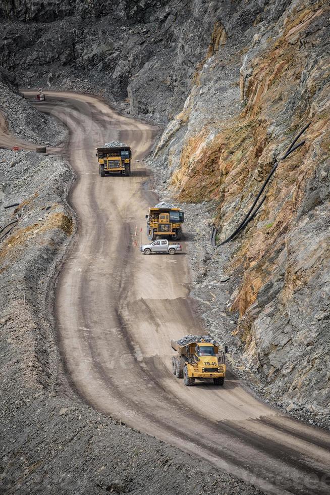Open pit mine industry, big yellow mining truck for coal anthracite. photo