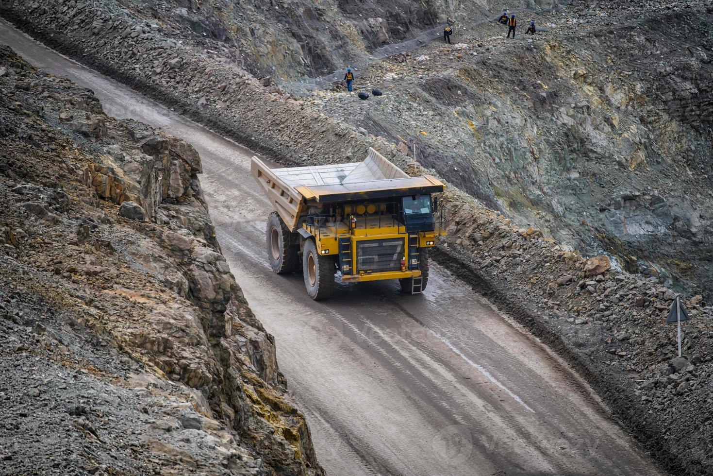 Open pit mine industry, big yellow mining truck for coal anthracite. photo