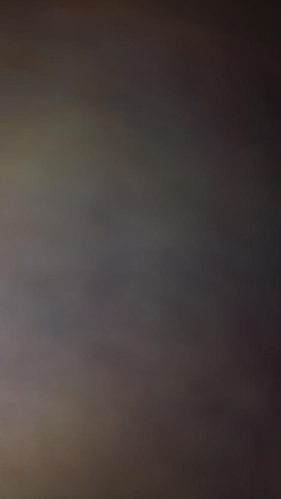 Abstract blur background with brown gray, black, white and earth tones. photo