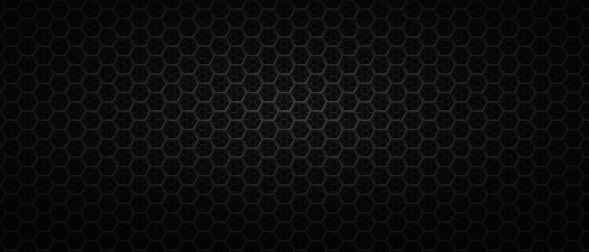 Black backdrop with metal hexagonal wire. Dark background with carbon