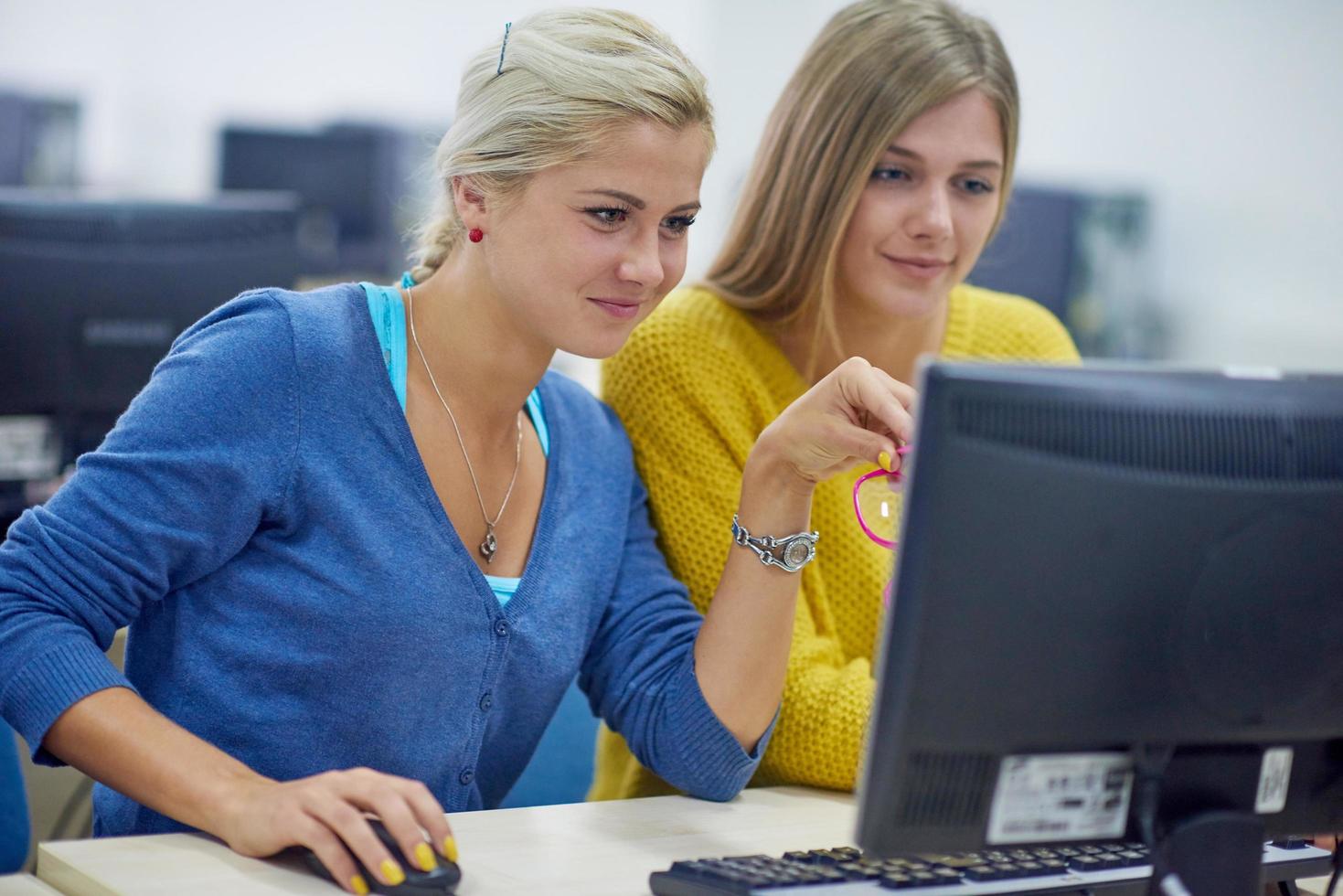 students group in computer lab classroom photo