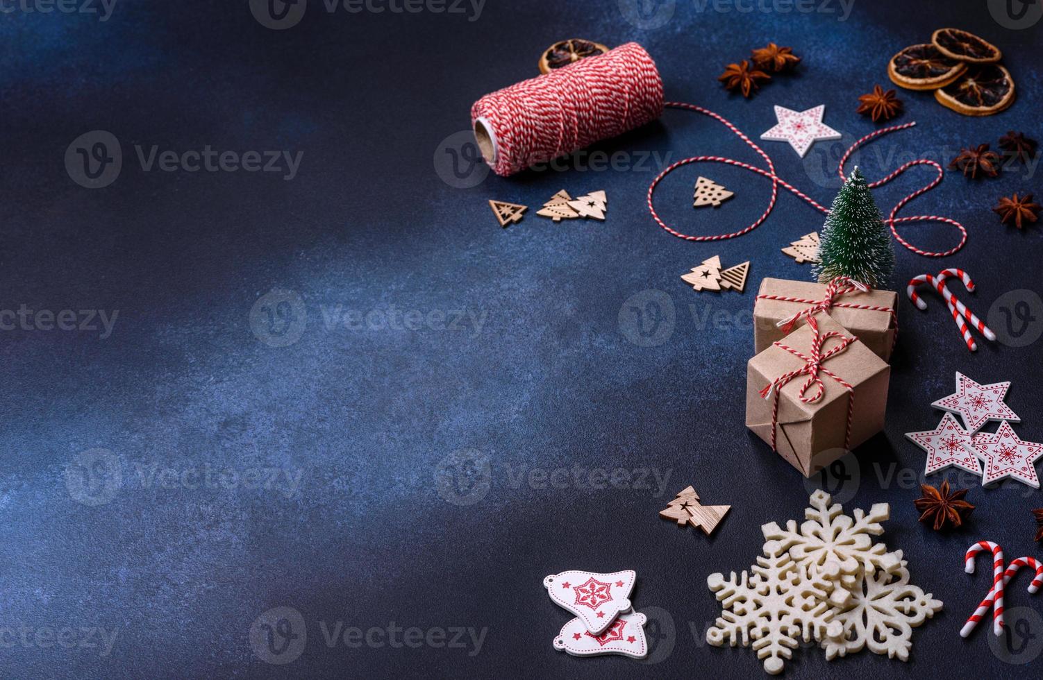 Christmas composition with gingerbread cookies, Christmas toys, pine cones and spices photo