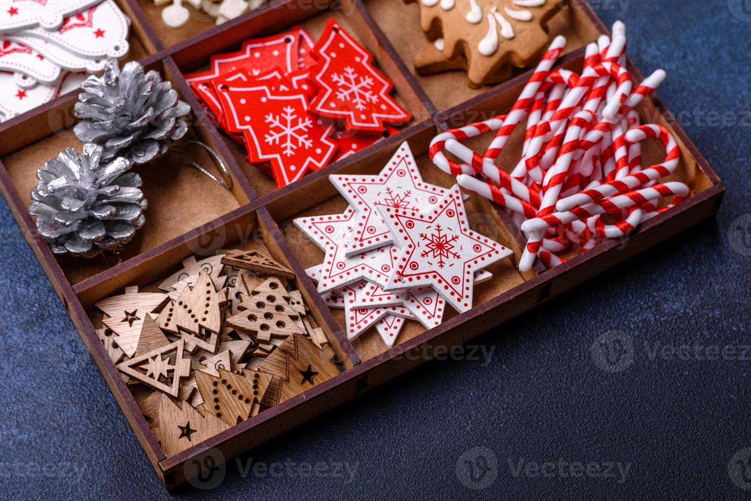 Christmas composition with gingerbread cookies, Christmas toys, pine cones and spices photo