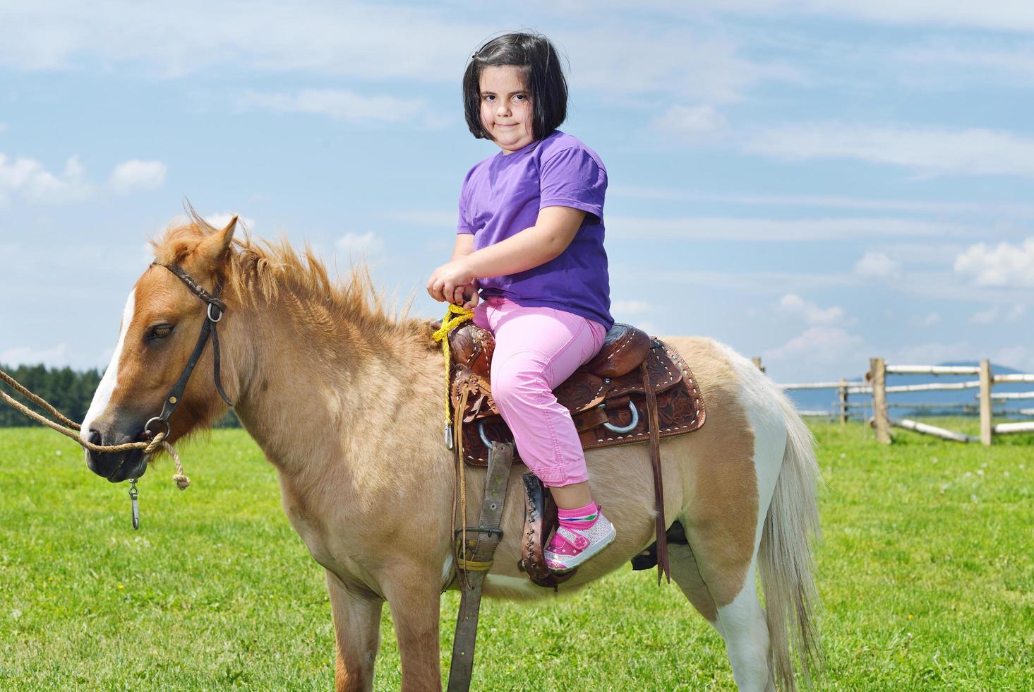 child ride pony photo