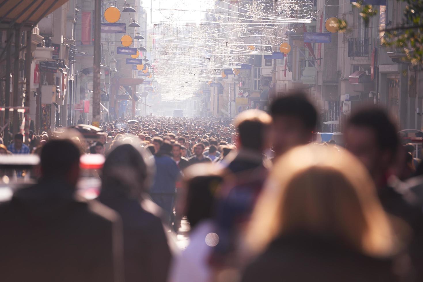 people crowd walking on street photo