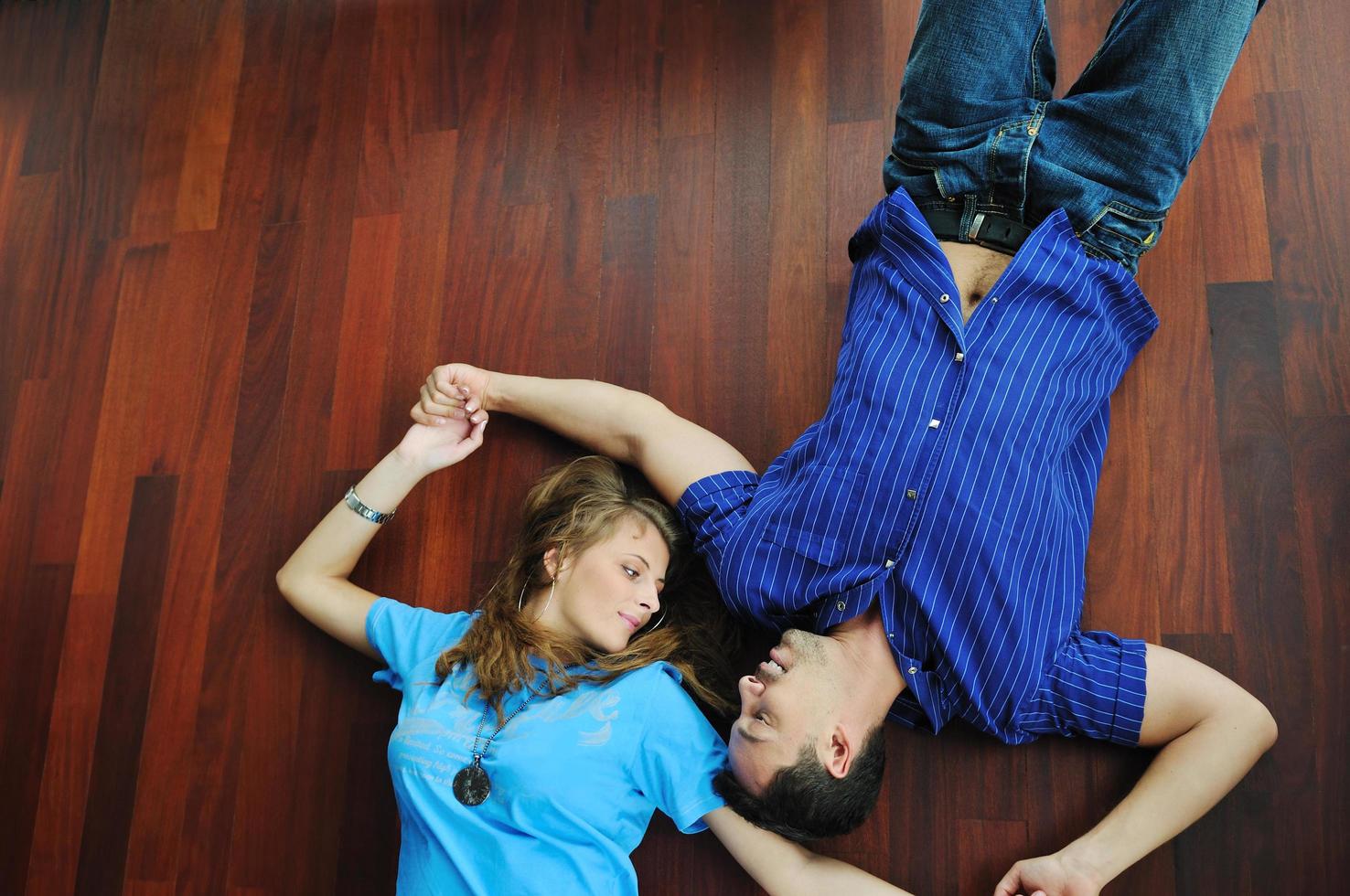 happy couple in empty apartment photo