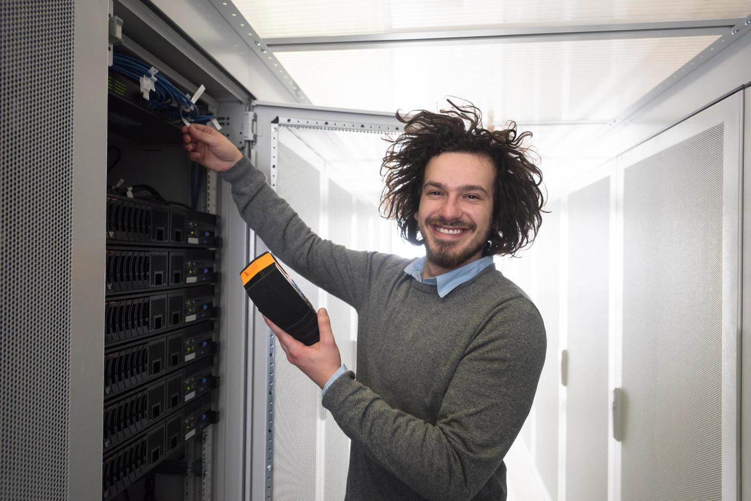 technician using digital cable analyzer photo