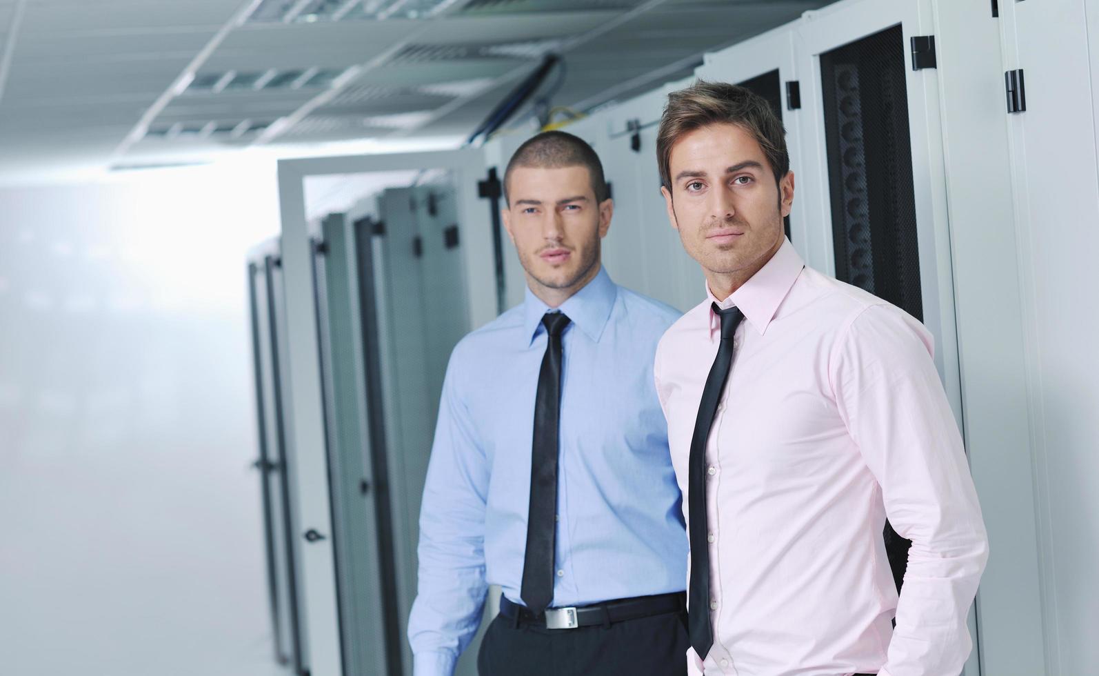 it engineers in network server room photo