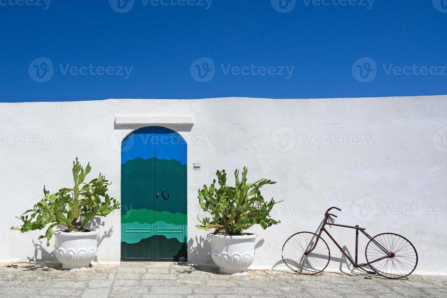 blue door in ostuni italy puglia photo