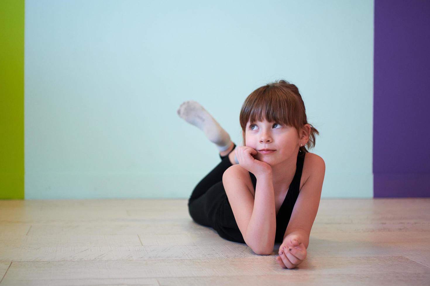 girl having fun and dancing wearing mothers jewelry photo