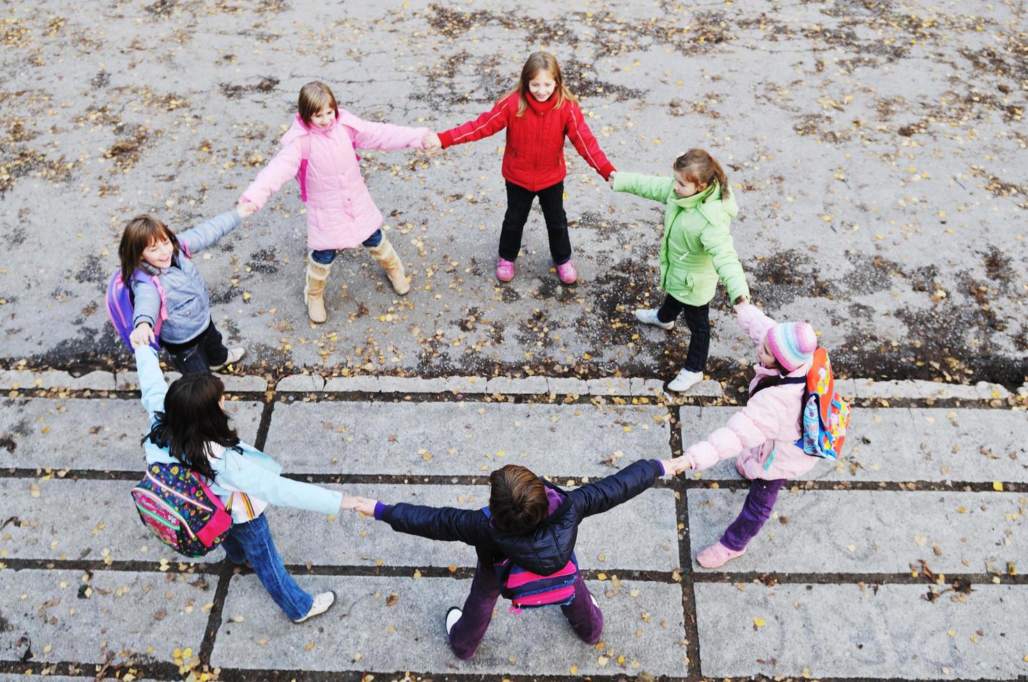 school girls running away photo