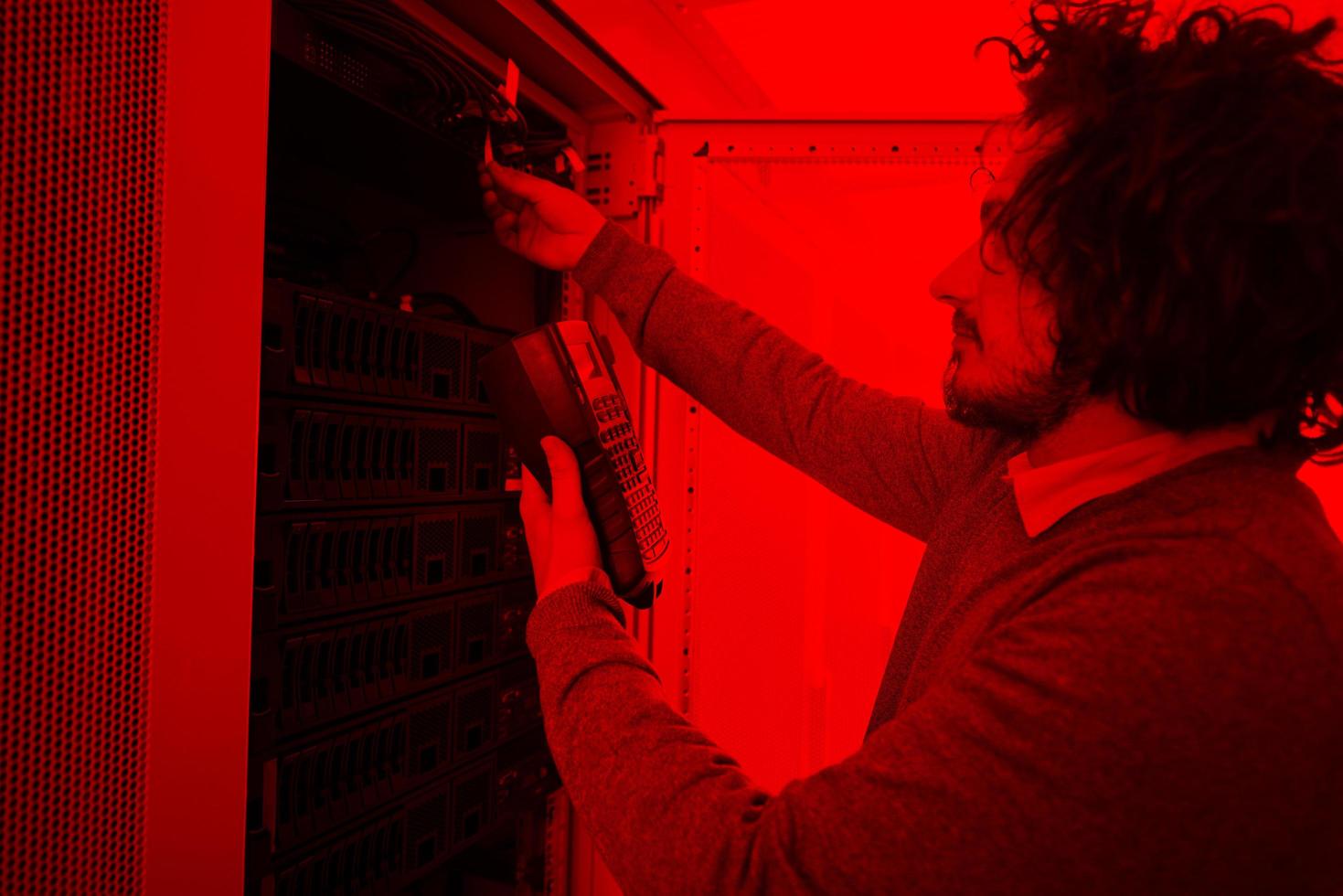 technician using digital cable analyzer photo