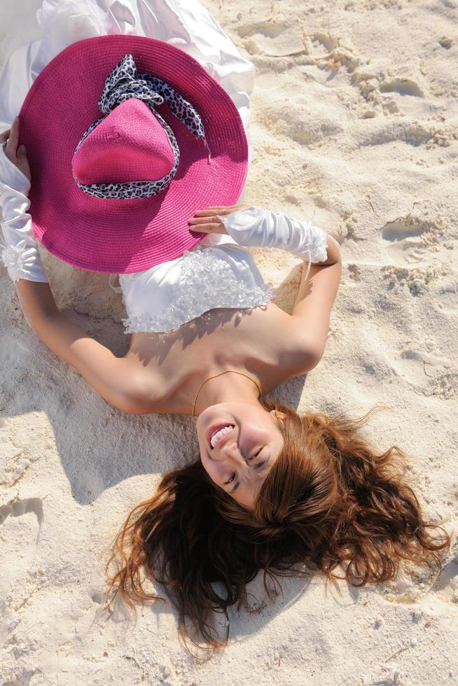 asian bride on beach photo