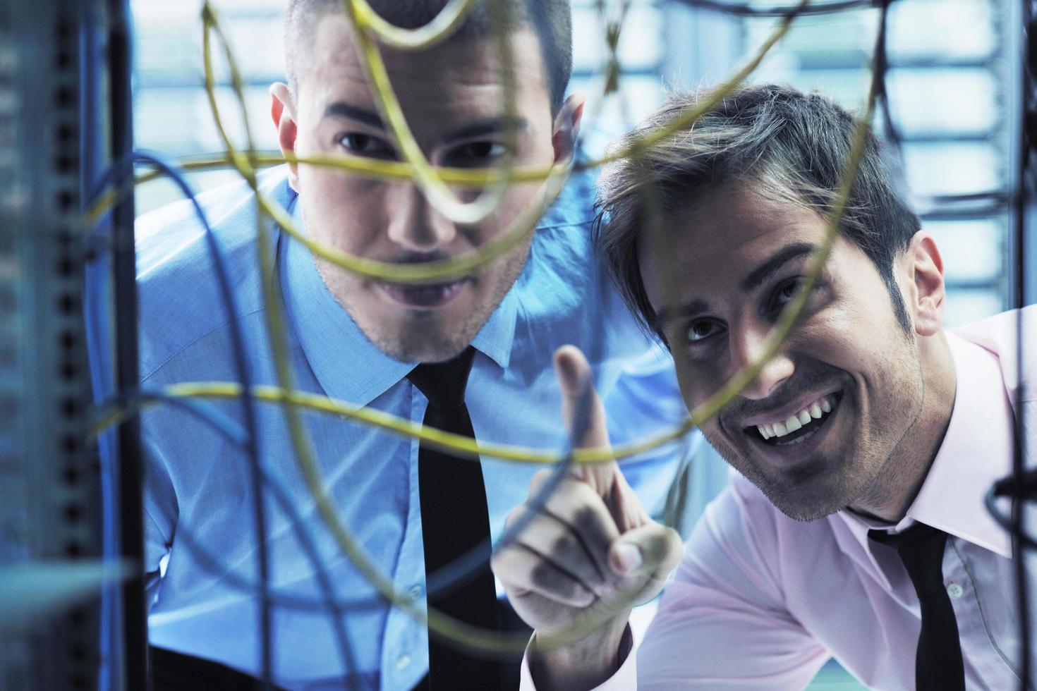it enineers in network server room photo
