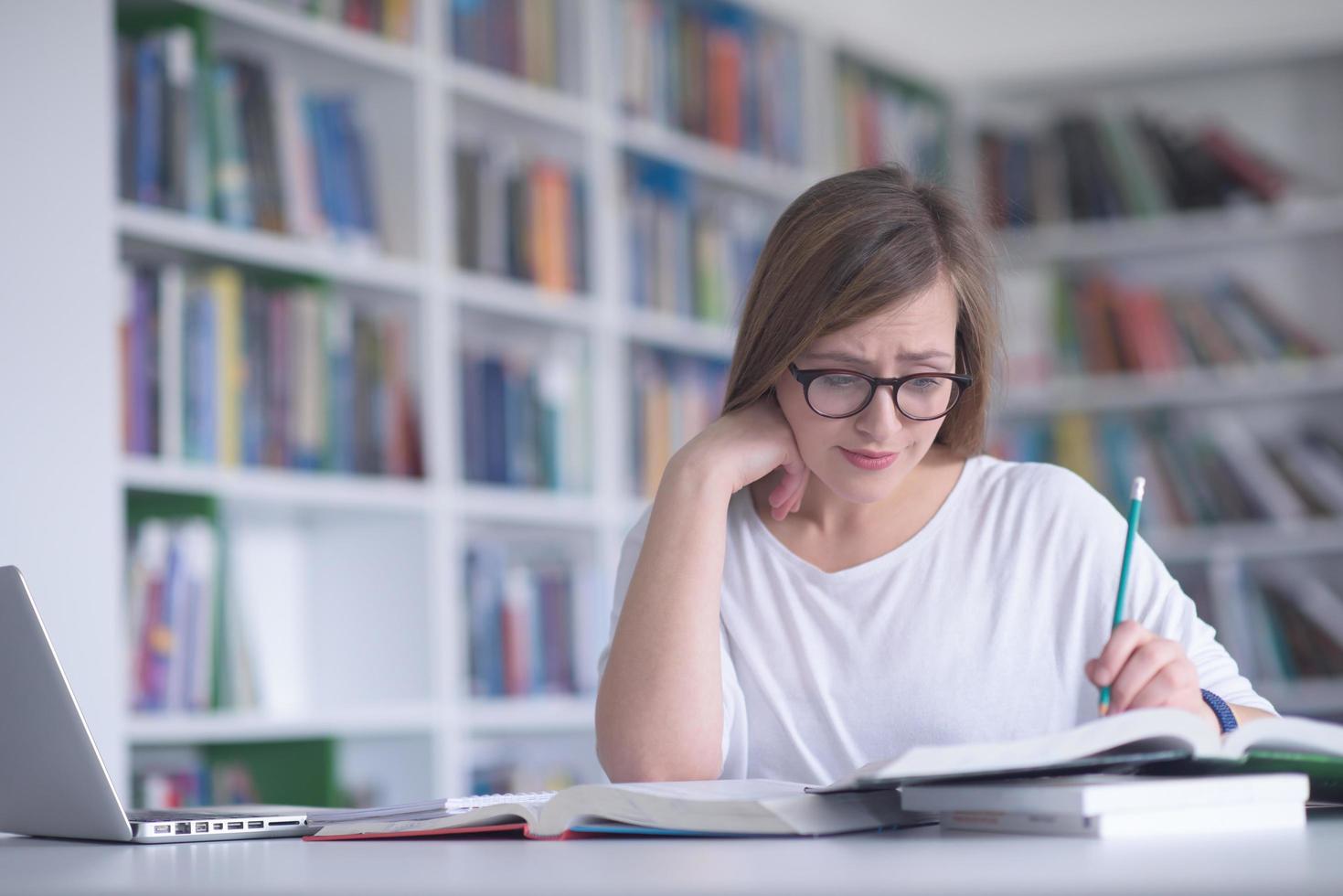 female student study in school library photo