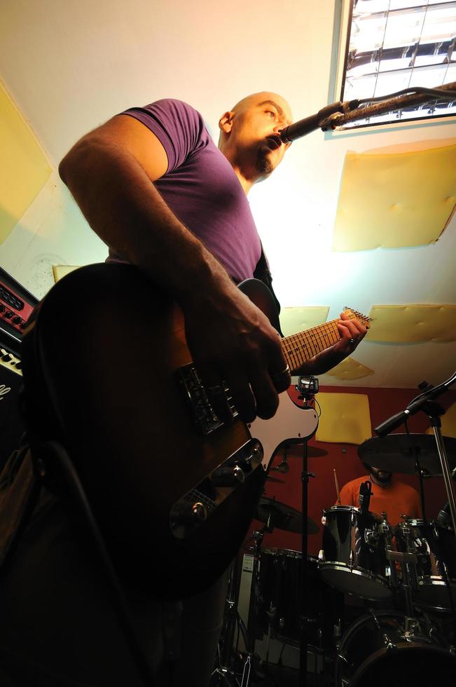 music band have training in garage photo