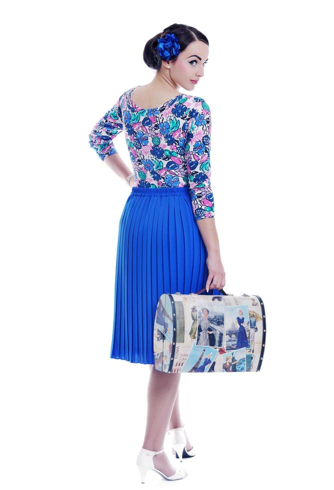 pinup retro  woman with travel bag isolated photo