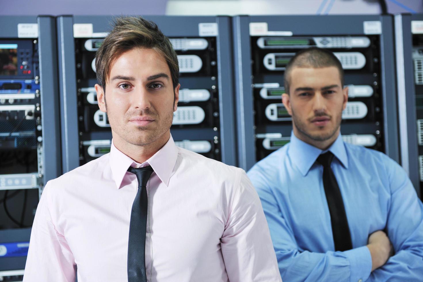 it engineers in network server room photo