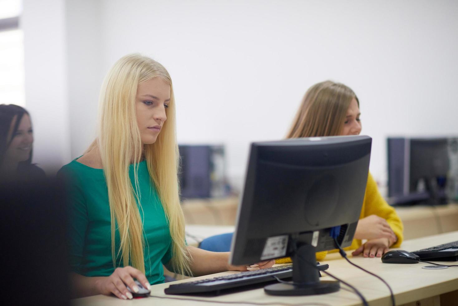 students group in computer lab classroom photo