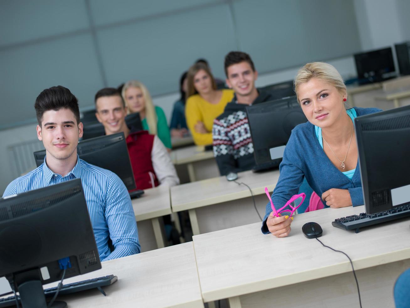 students group in computer lab classroom photo
