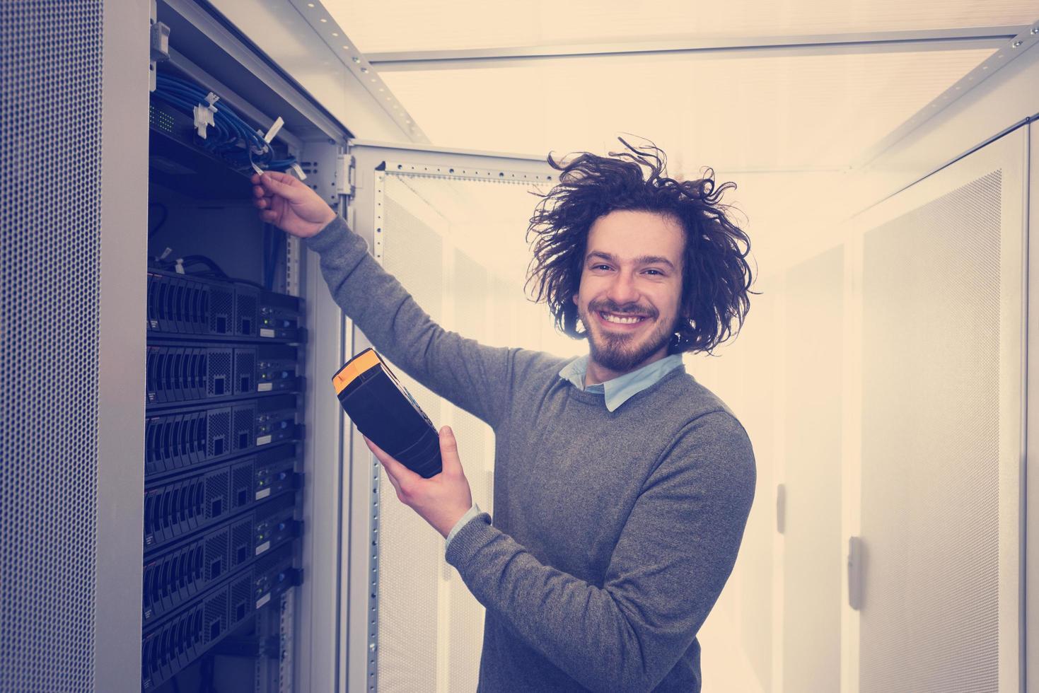 technician using digital cable analyzer photo