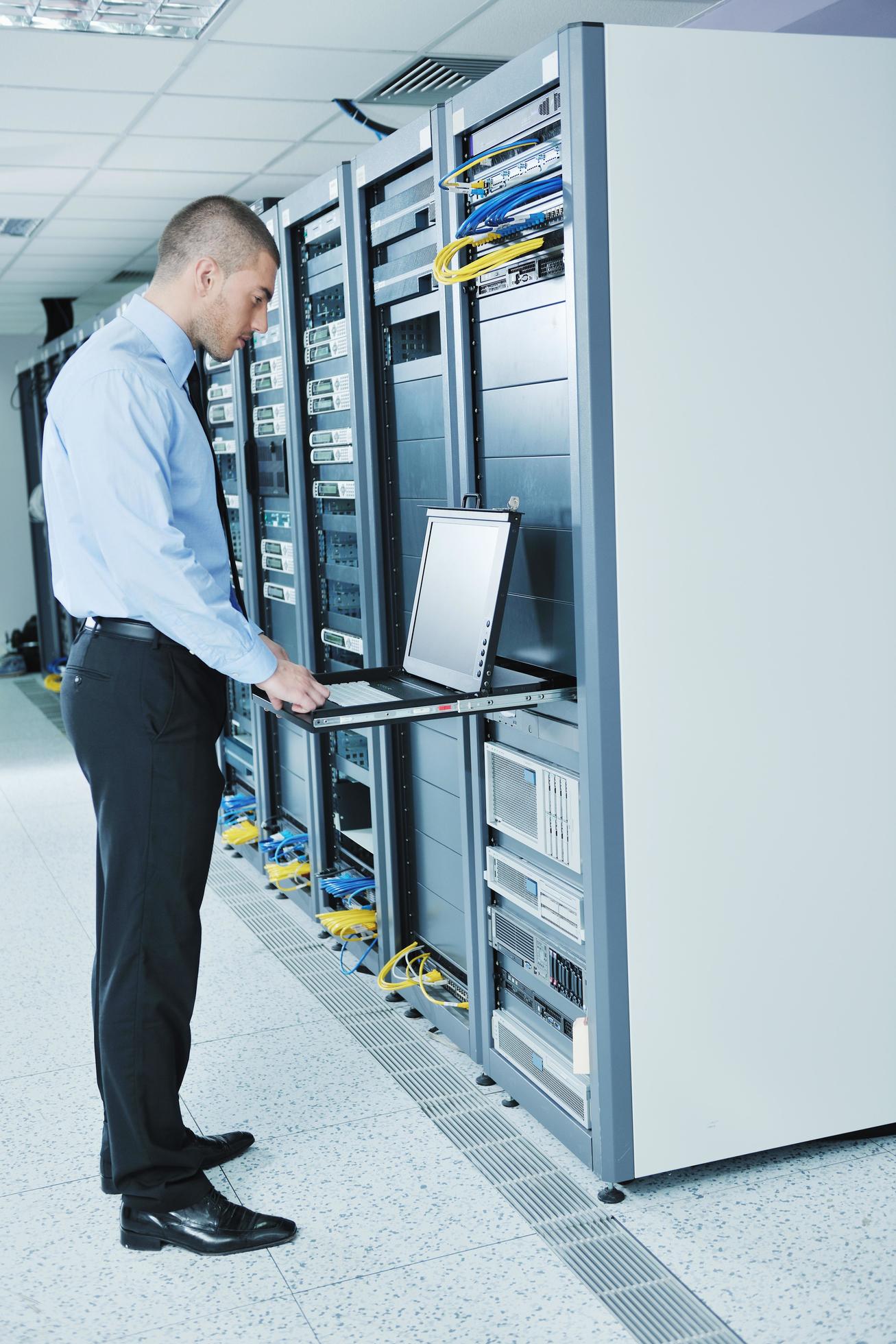 young it engineer in datacenter server room 11921998 Stock Photo at ...