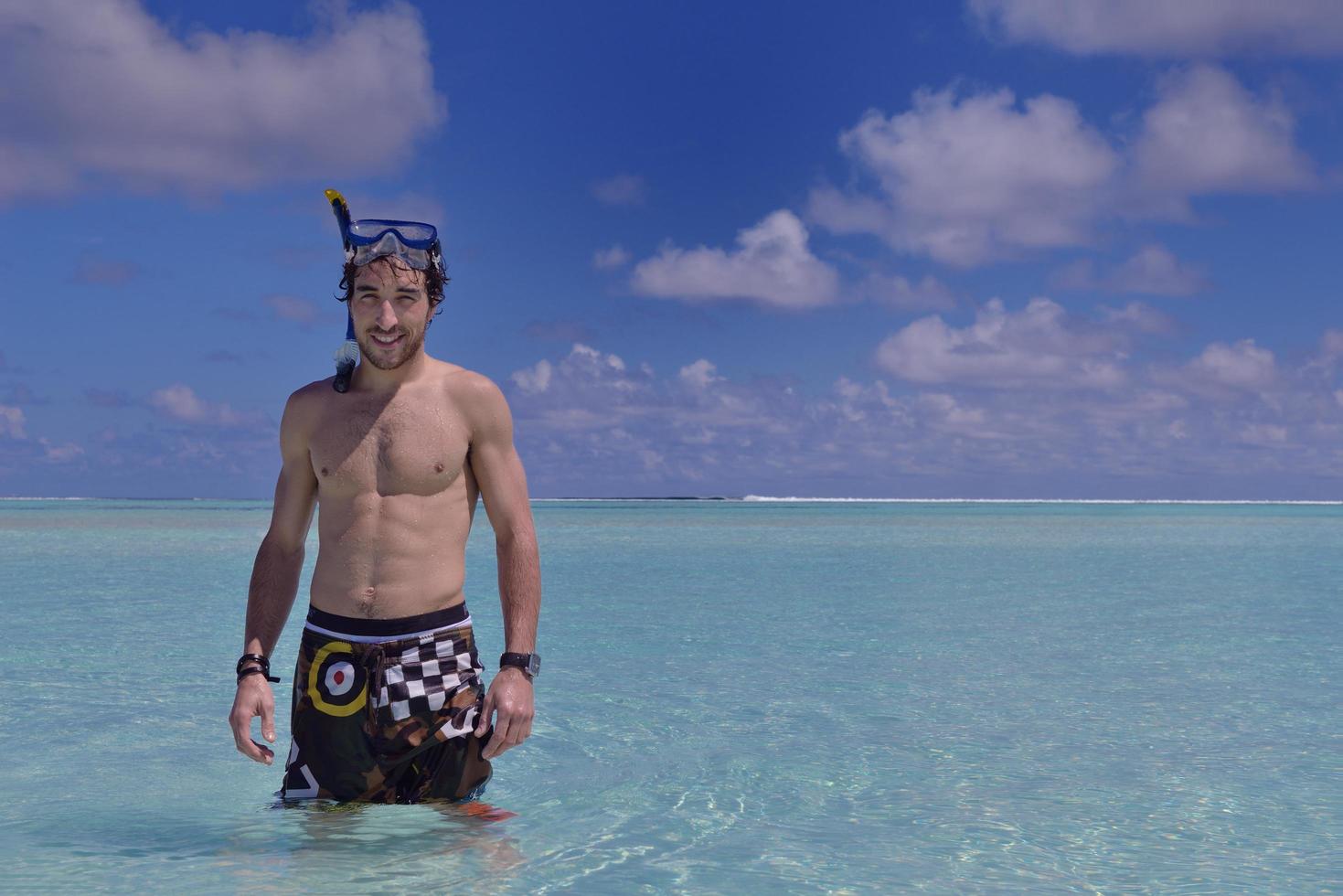 young guy with diving mask photo