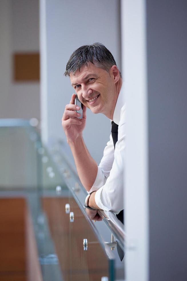 business man using phone photo