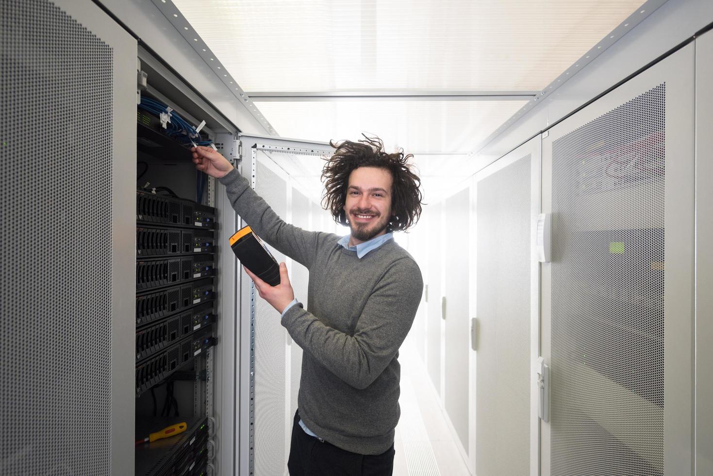 technician using digital cable analyzer photo