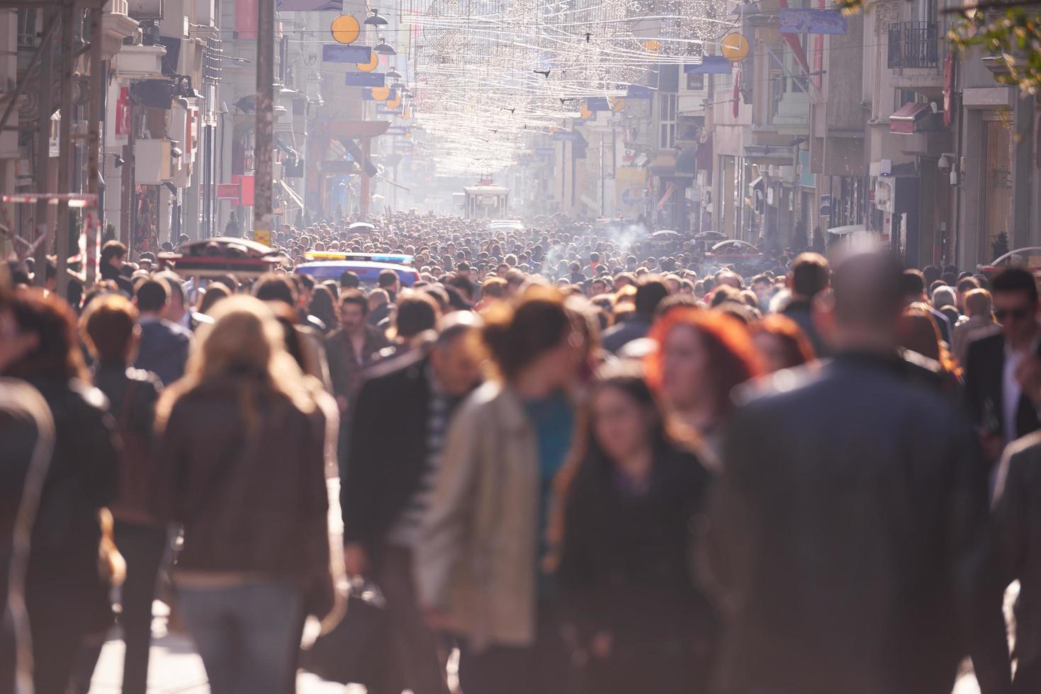 people crowd walking on street photo