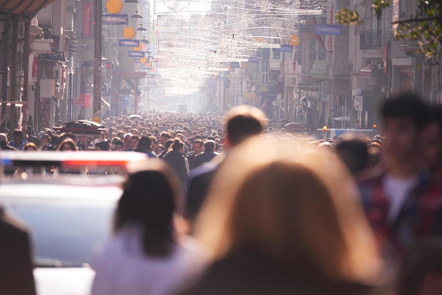 people crowd walking on street photo