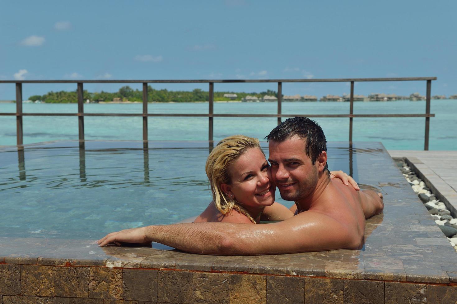 happy young  couple at summer vacation have fun and relax at beach photo
